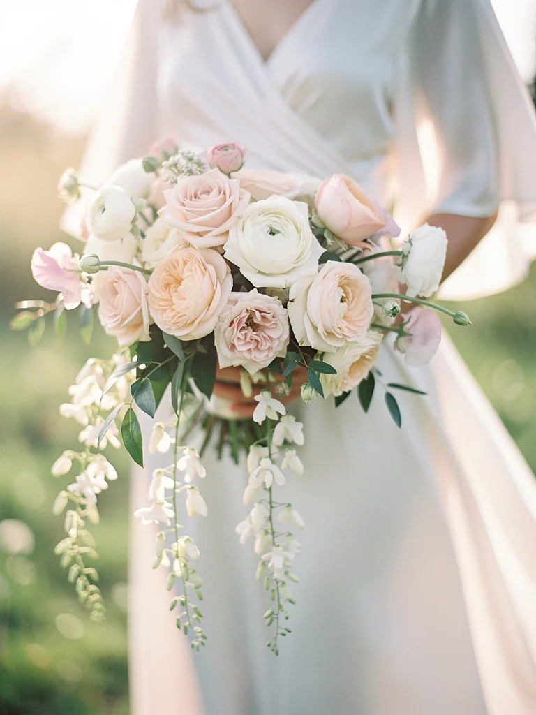 Elegant bridal bouquet with garden roses and seasonal flowers